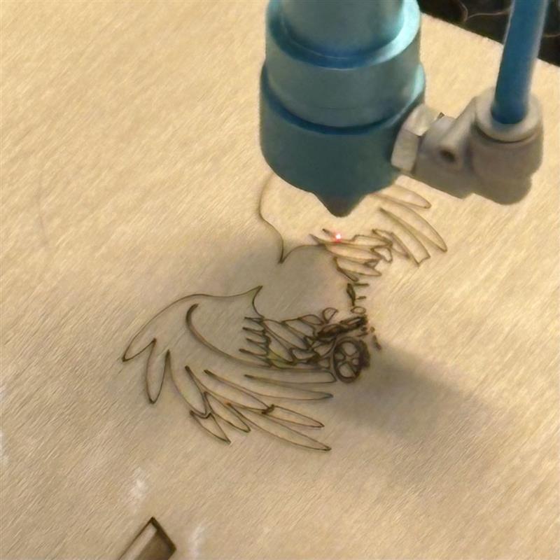 The machine is doing the laser cutting 